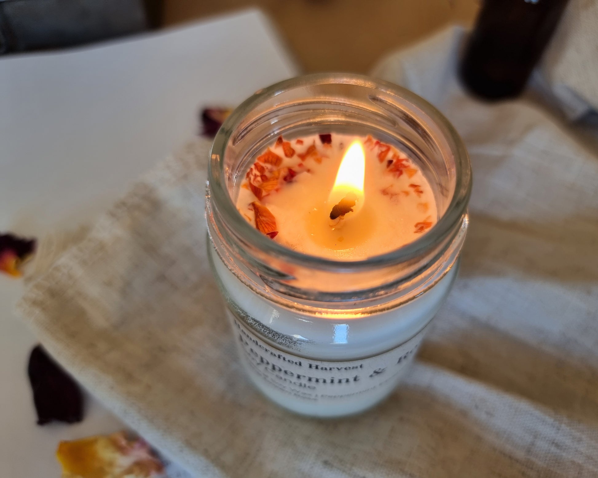 Peppermint and Rose Soy Candle: Closeup of rose petals on top