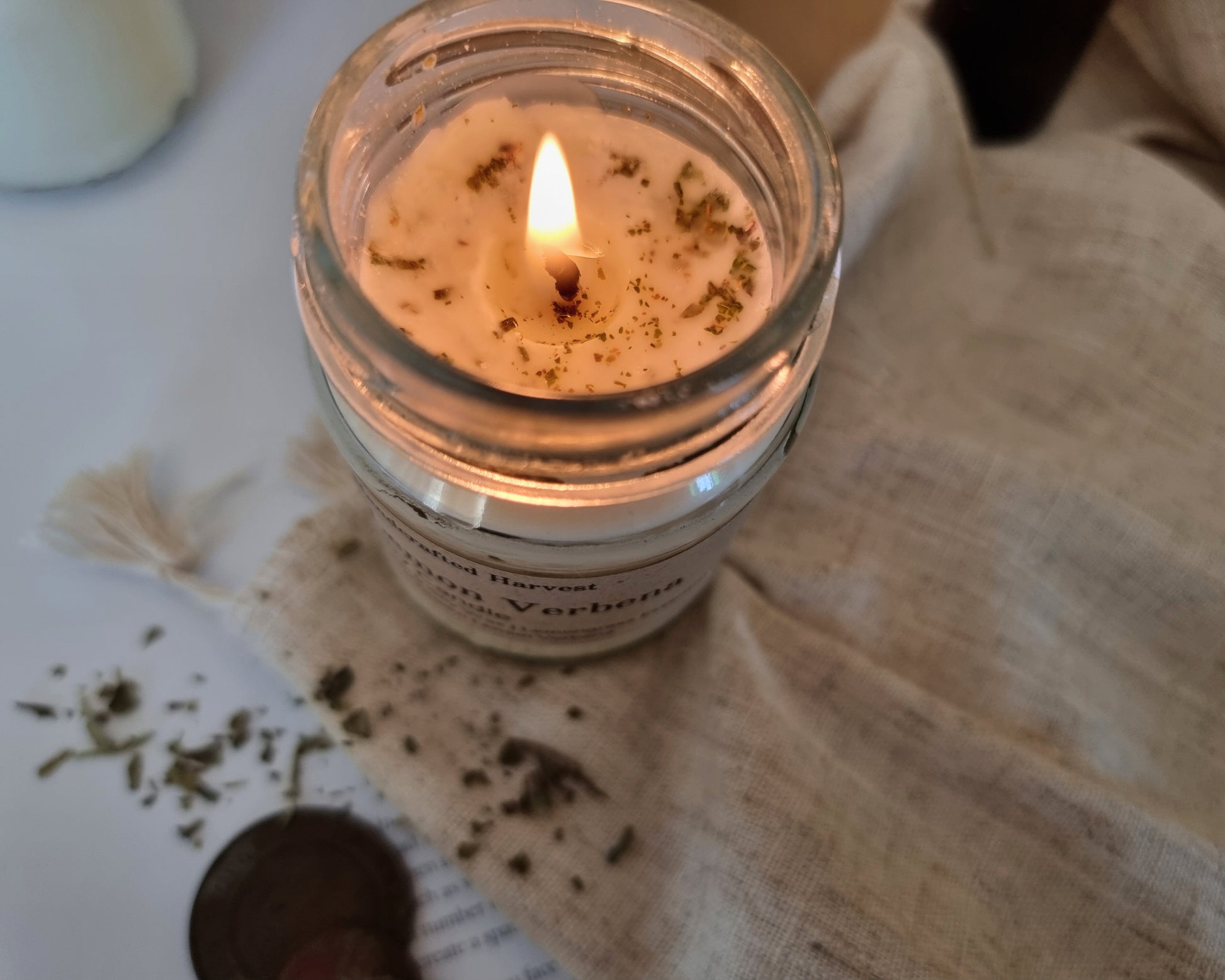 Close up Lemon Verbena Soy Candle - Showing Dried Lemon Verbena scattered on top